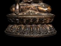 A Large Nepalese Gilt Bronze Figure of Seated Buddha