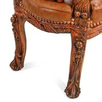 A Pair of Italian Carved Monkey Motif Fantasy Armchairs