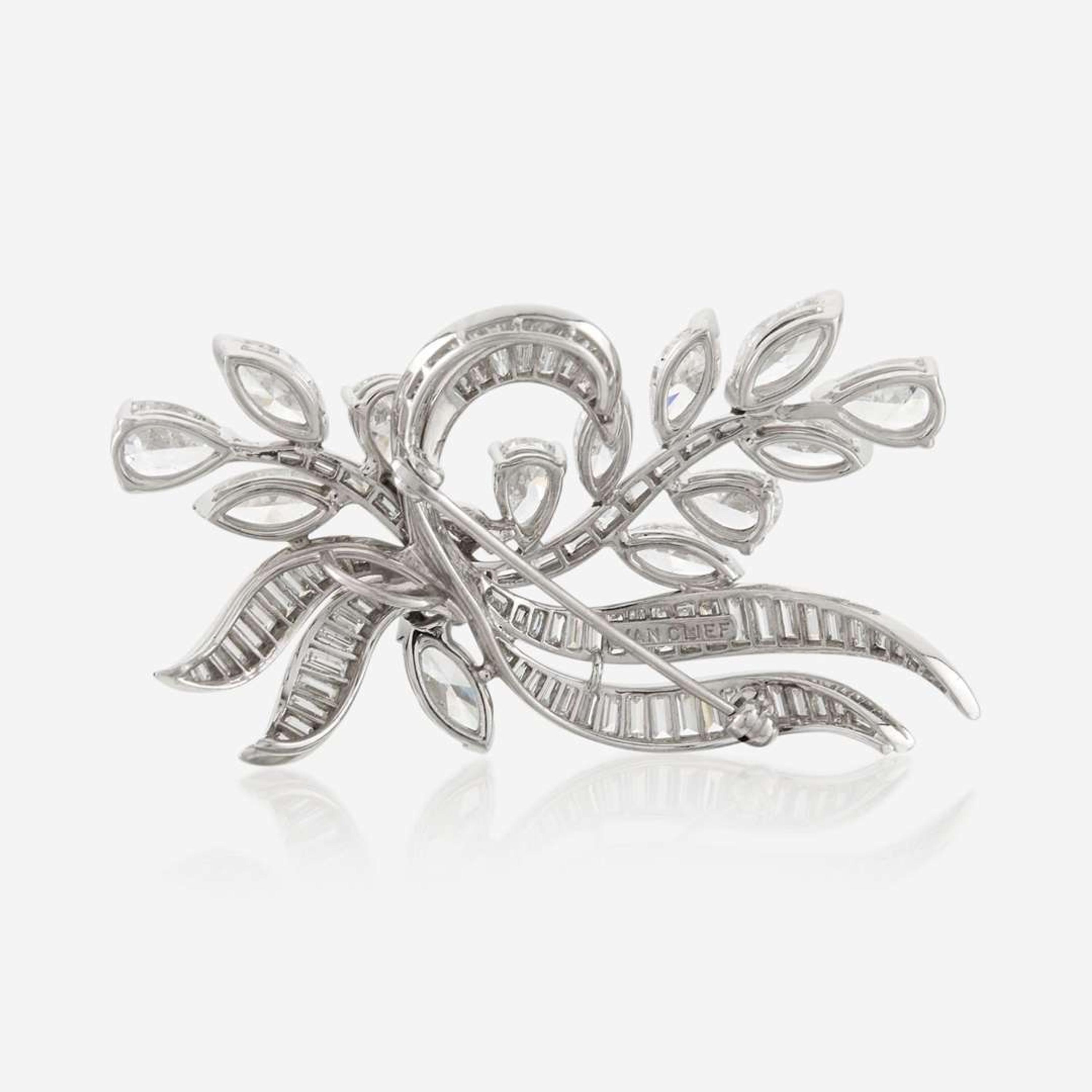 A platinum and diamond pendant/brooch, Elwood Van Clief c. 1960