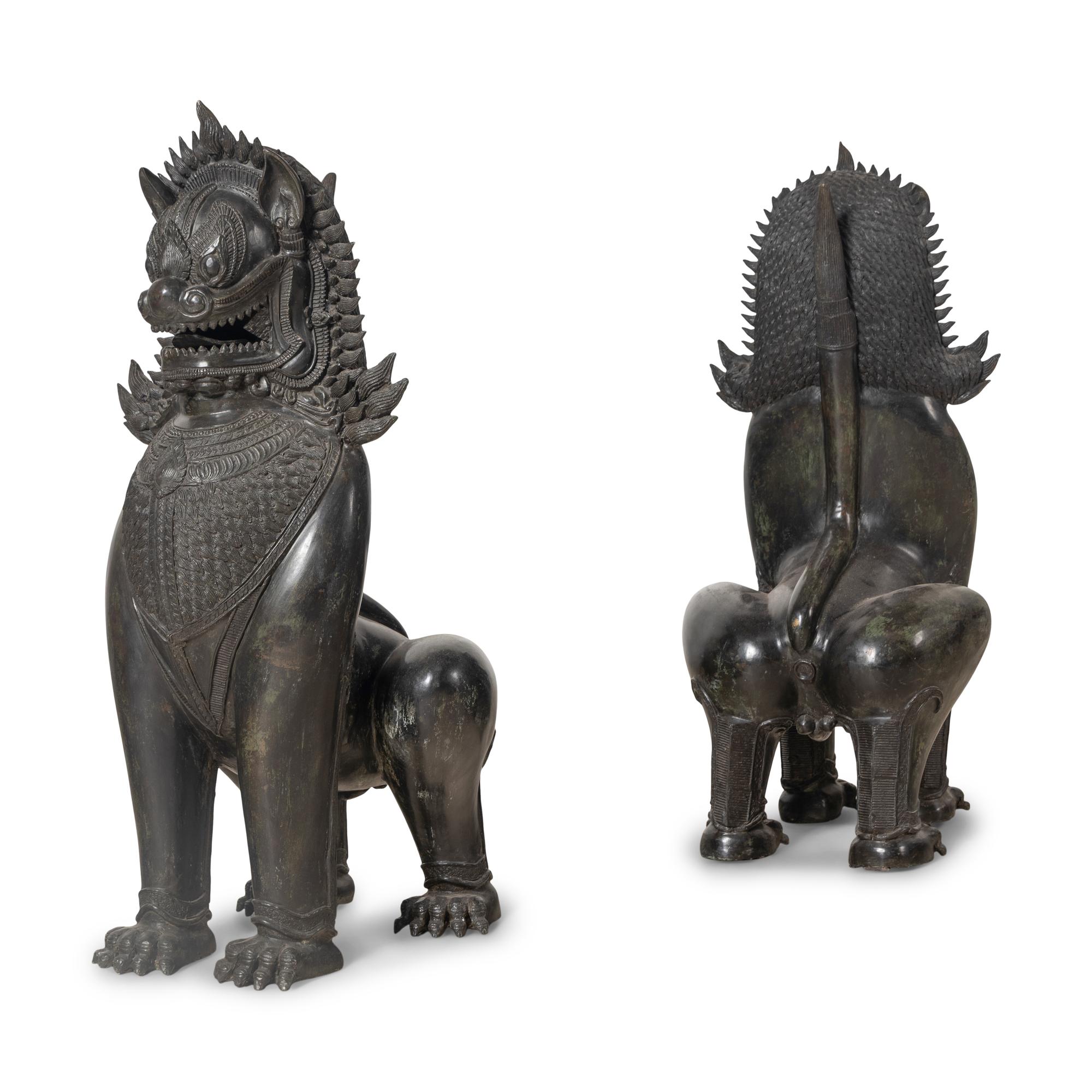 A Pair of Patinated Bronze Guardian Lions