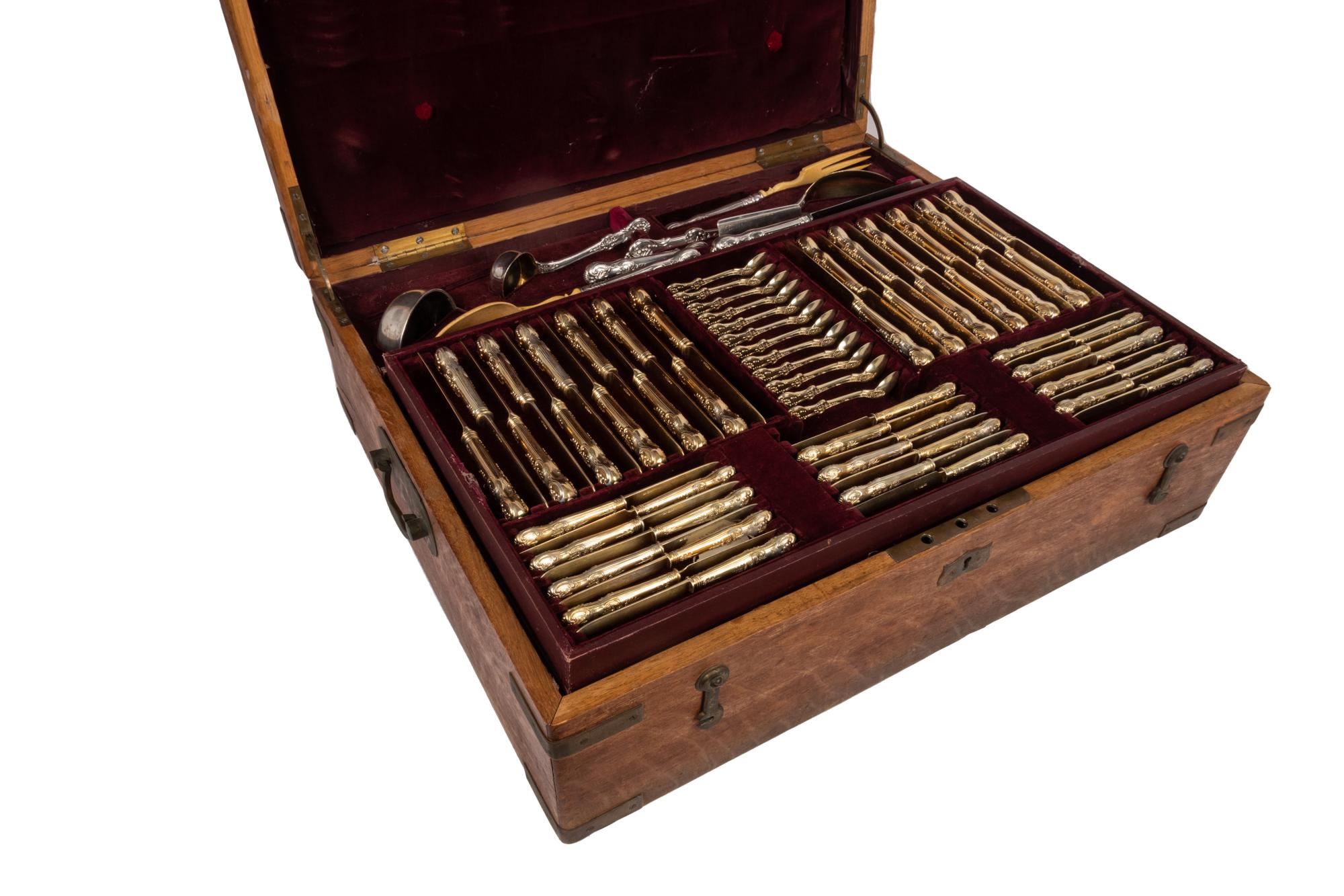 An Extensive Russian Silver and Silver-Gilt Flatware Service in Original Fitted Case