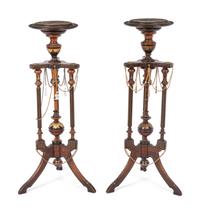 A Pair of Victorian Part-Ebonized and Gilt Walnut Plant Stands