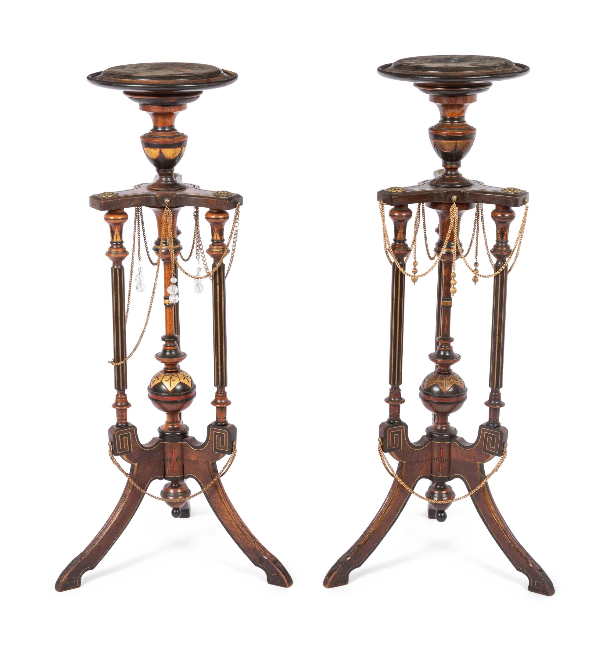 A Pair of Victorian Part-Ebonized and Gilt Walnut Plant Stands