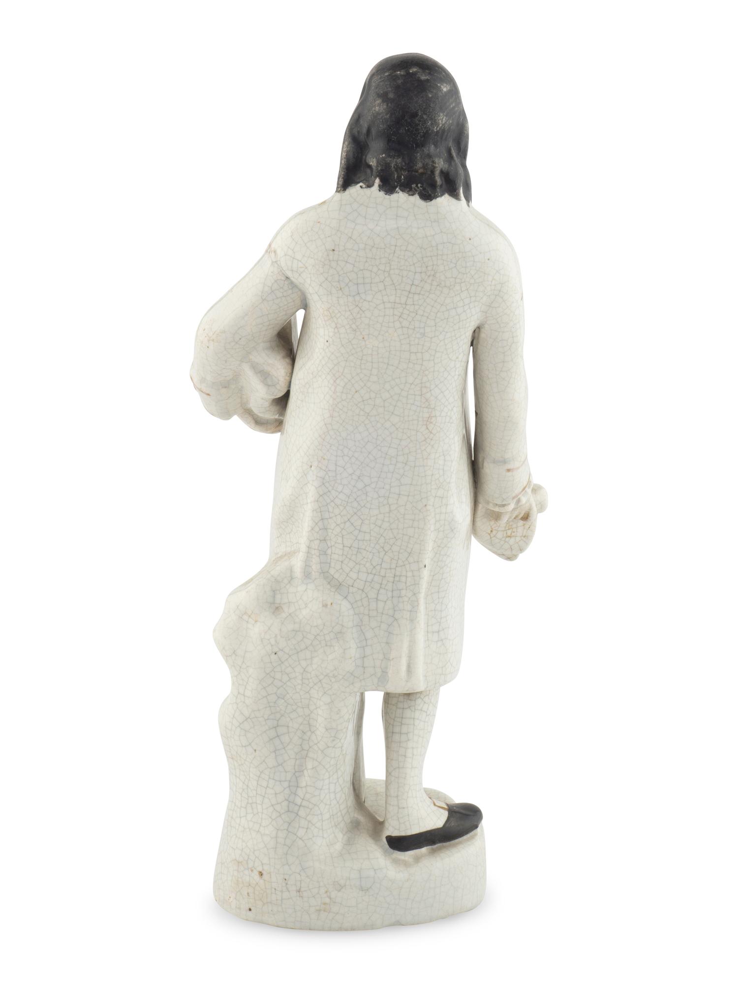 A Staffordshire Ceramic Figure of Benjamin Franklin