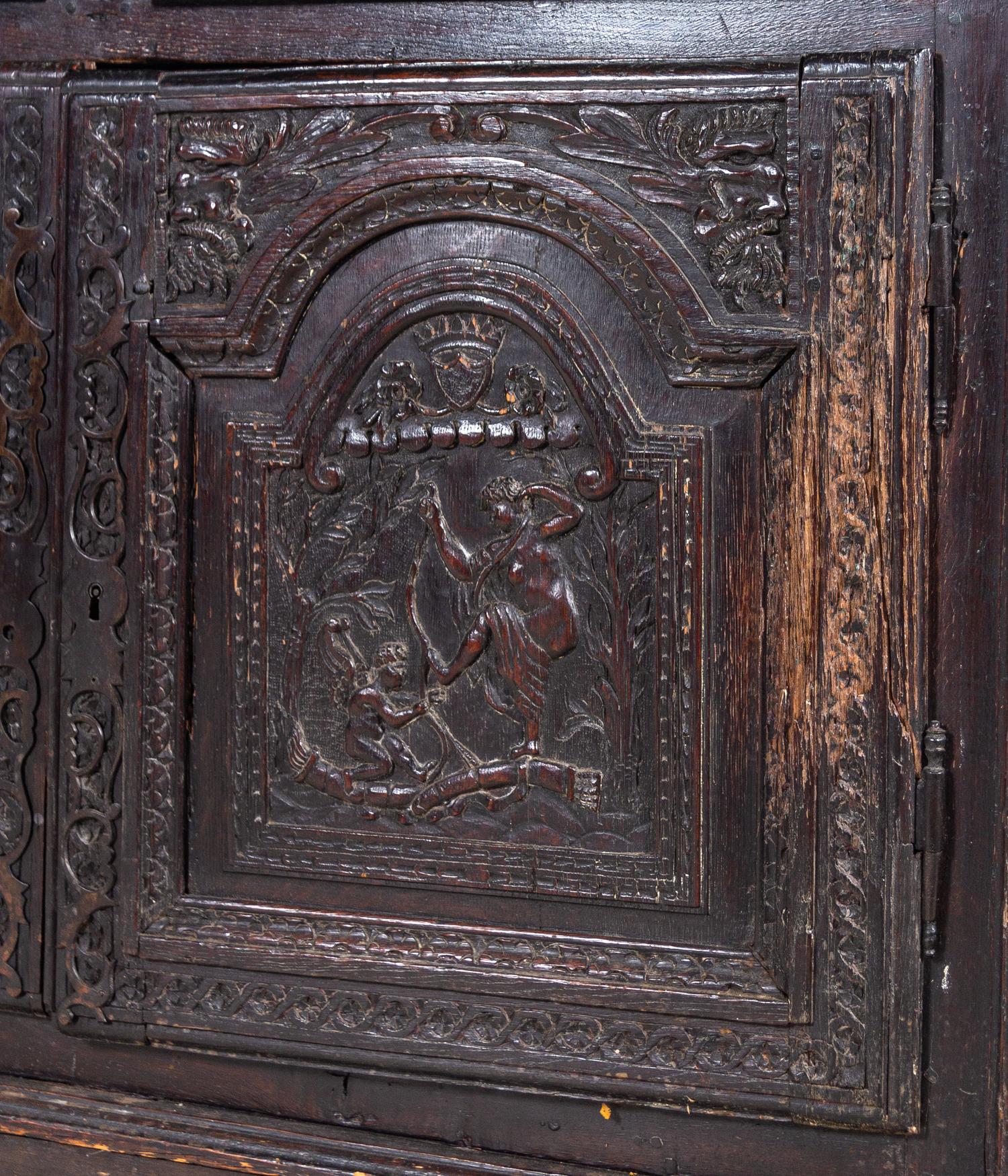 A Renaissance Style Carved Walnut Cabinet