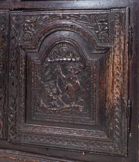 A Renaissance Style Carved Walnut Cabinet