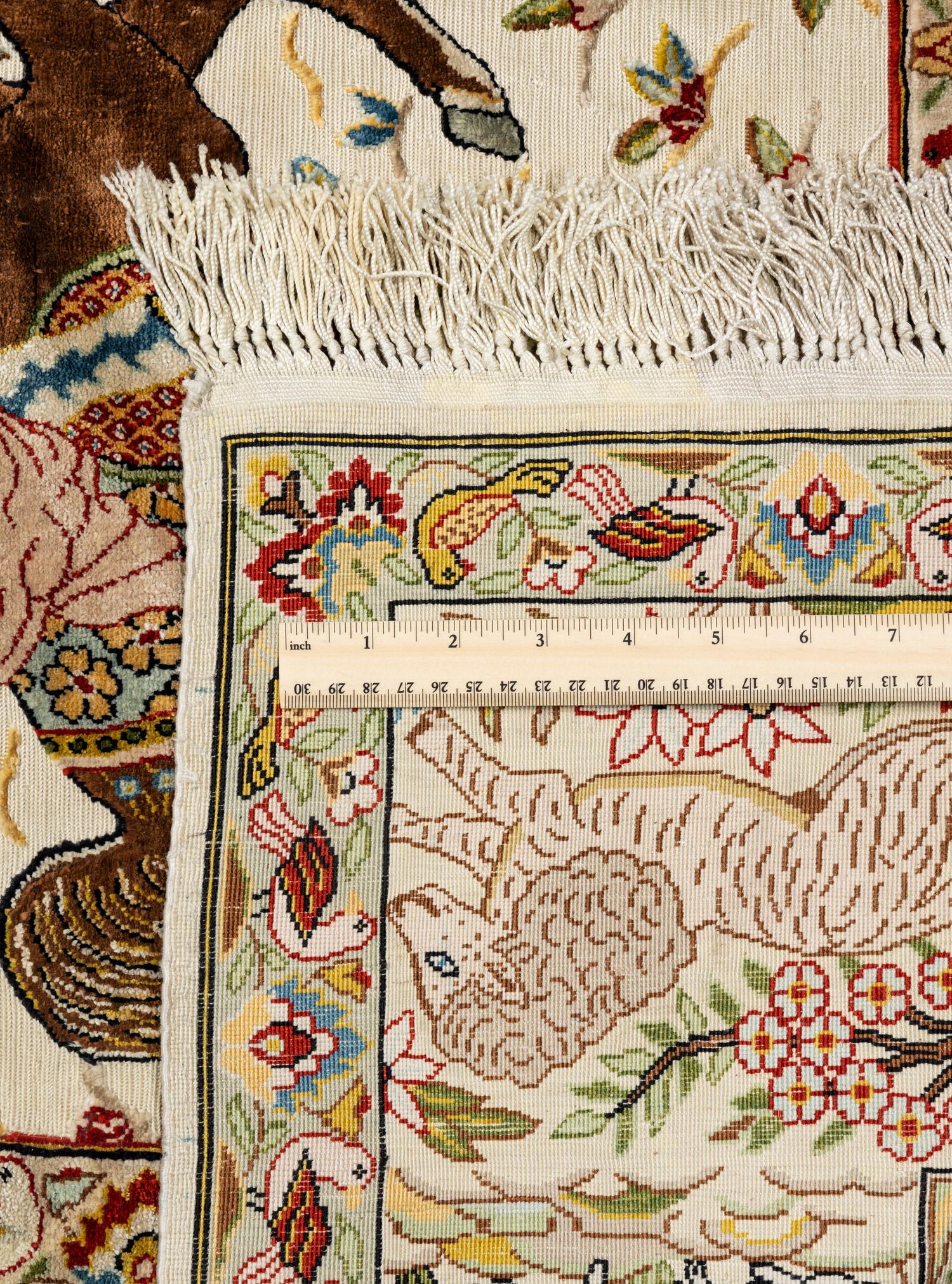 A Kirman Silk Pictorial Rug
