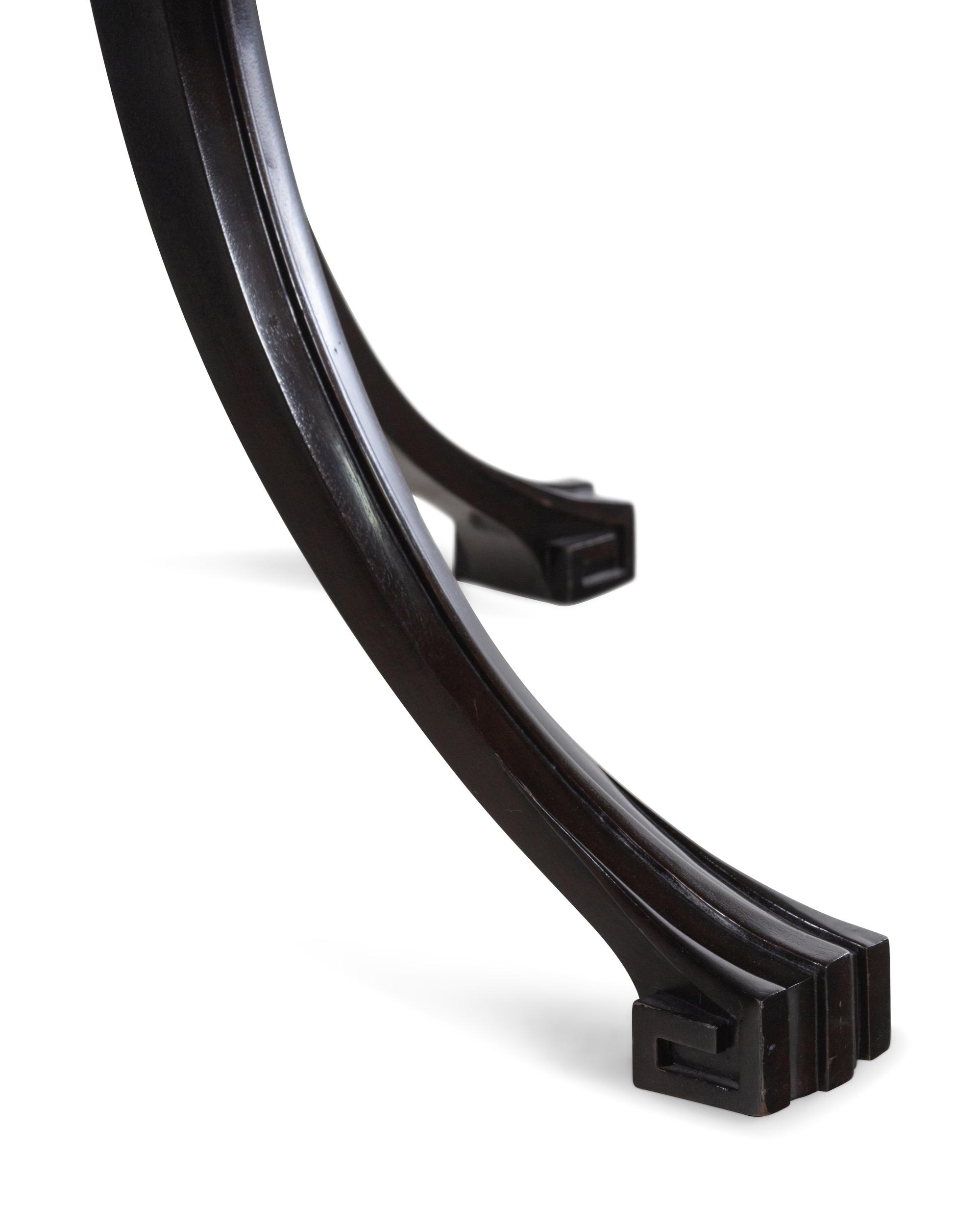 A Contemporary Steel-Banded Stained Mahogany Dining Table