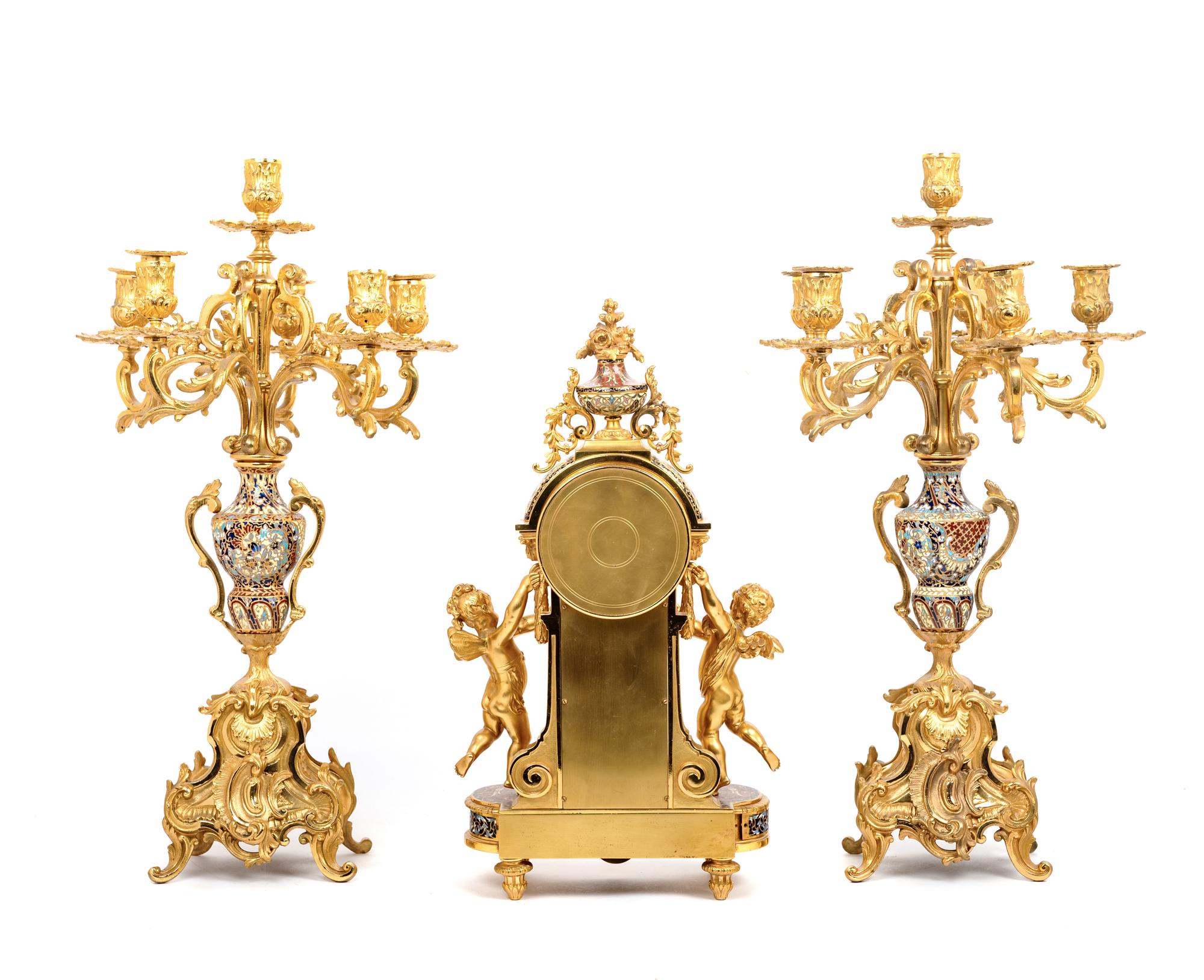A French Gilt Bronze and Champlevé Clock Garniture Retailed by Tiffany and Co.