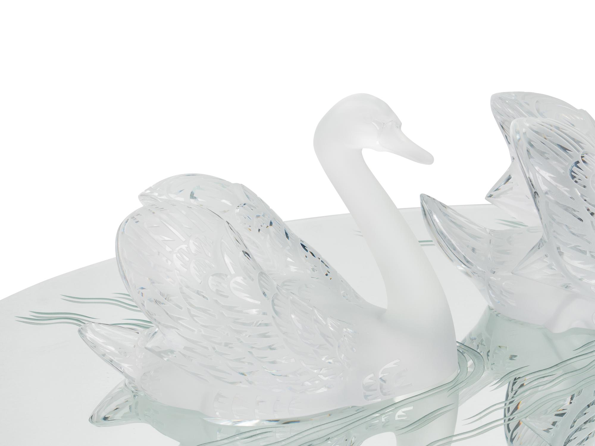 A Pair of Lalique Miroir Cygnes Sculptures and Mirror Plateau