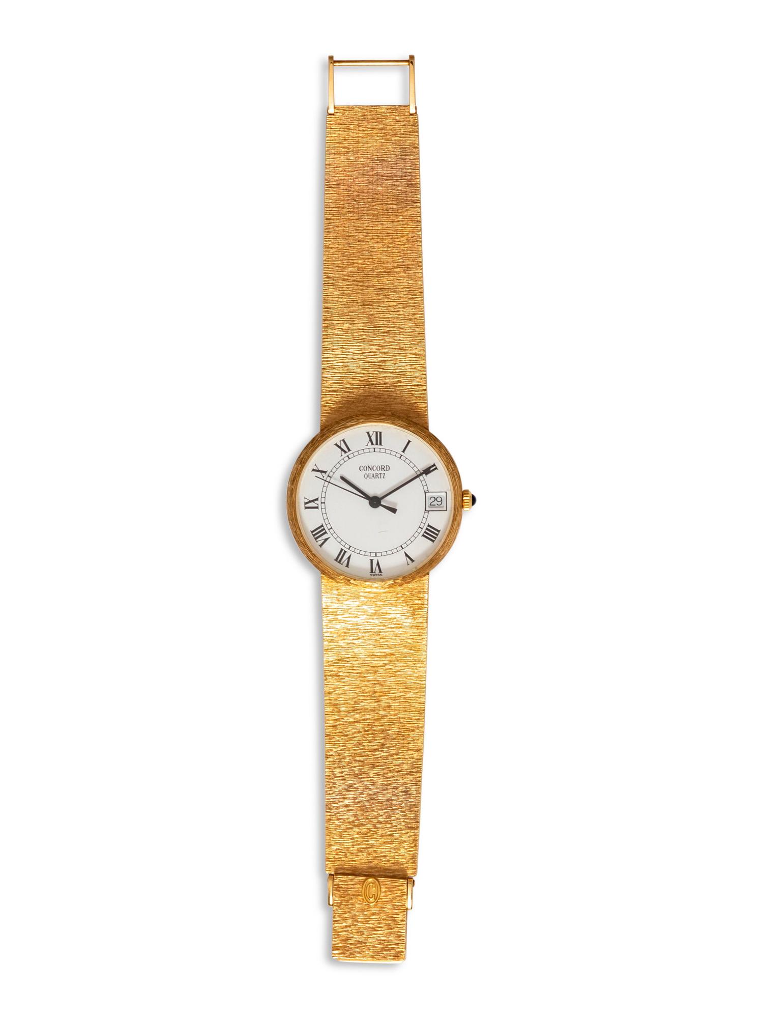 A 14 Karat Yellow Gold Wristwatch, Concord,