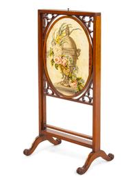 A Victorian Needlepoint-Inset Mahogany Fire Screen