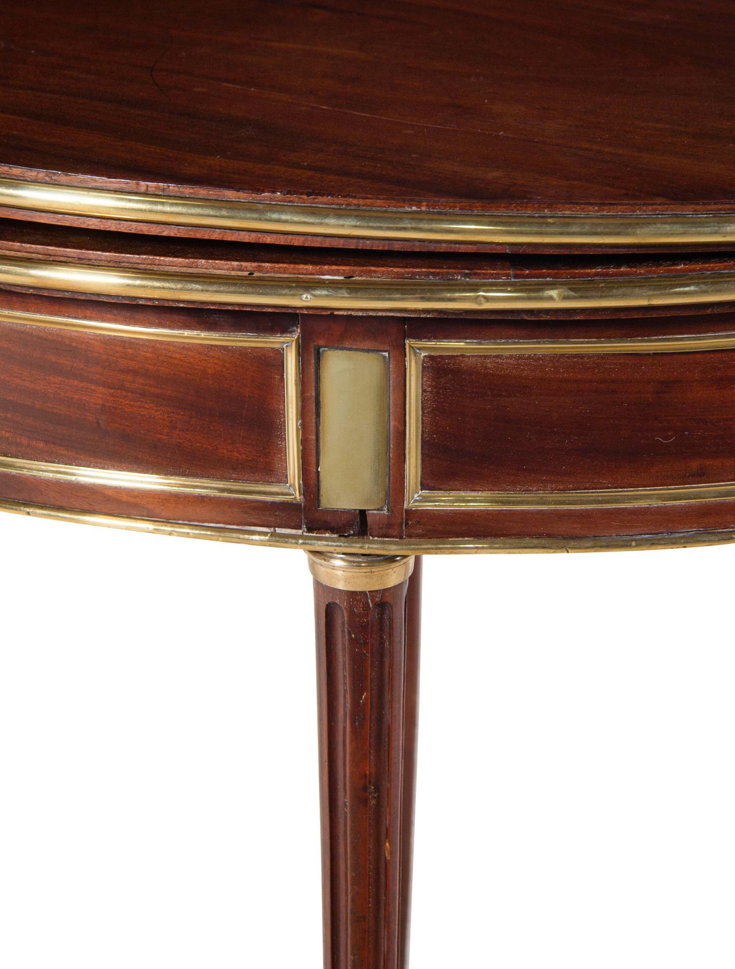 A Louis XVI Brass Mounted Mahogany Flip-Top Pier Table