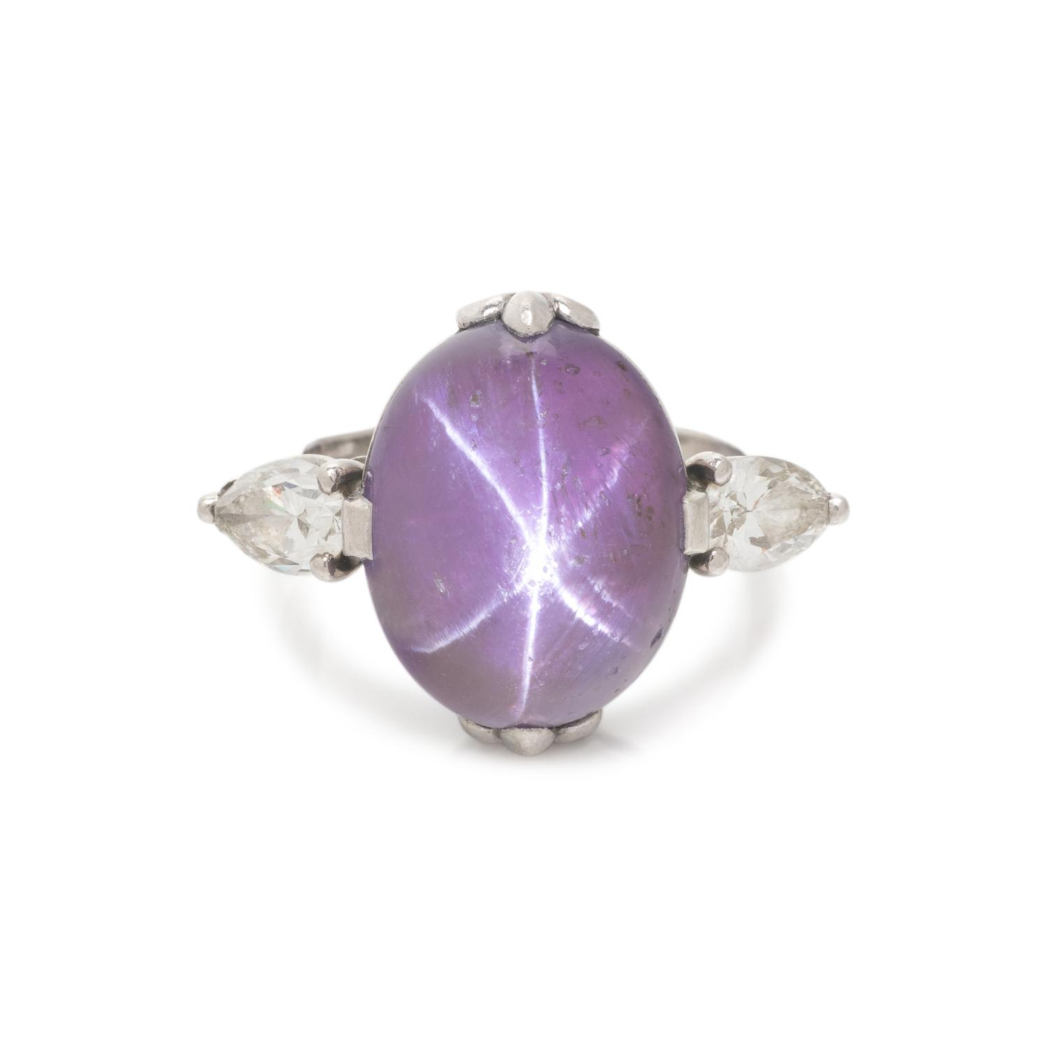 CARTIER, PURPLE COLOR CHANGE STAR SAPPHIRE AND DIAMOND RING