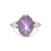 CARTIER, PURPLE COLOR CHANGE STAR SAPPHIRE AND DIAMOND RING