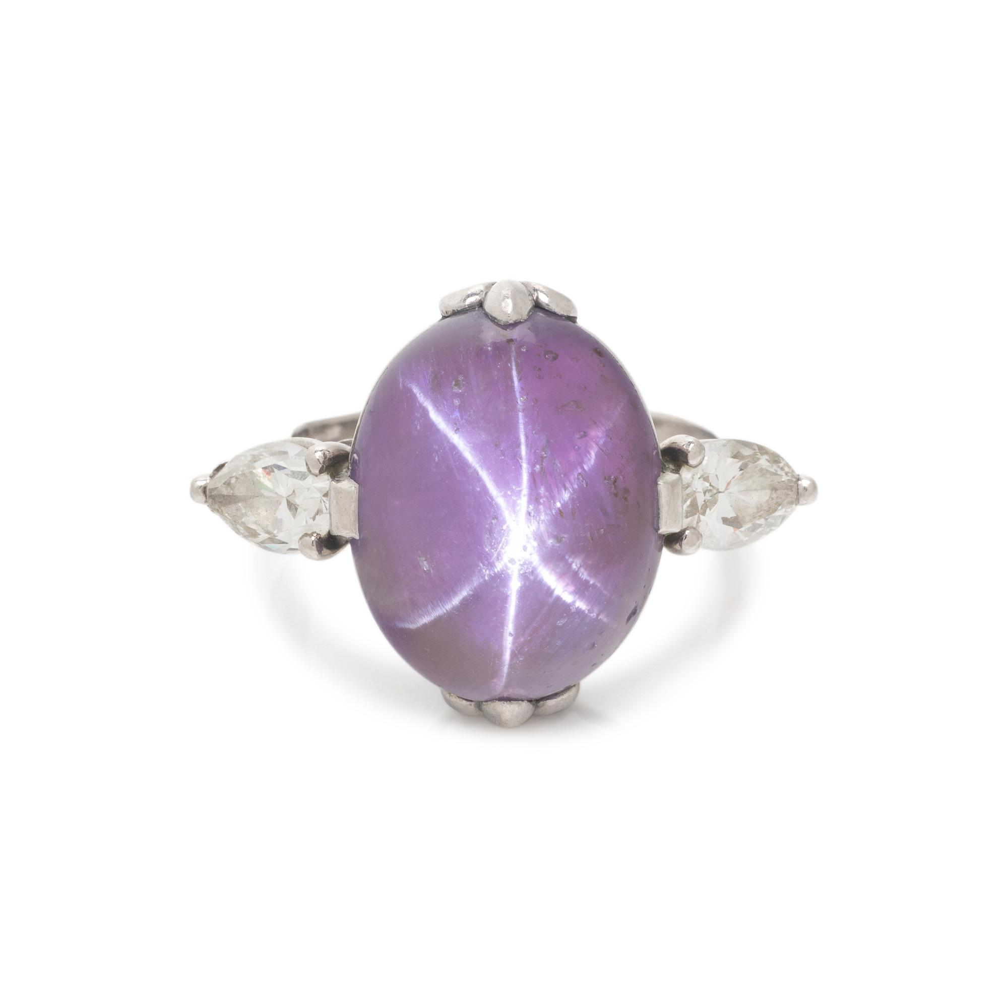CARTIER, PURPLE COLOR CHANGE STAR SAPPHIRE AND DIAMOND RING
