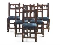 A set of Six Spanish Baroque Carved Walnut and Upholstered Side Chairs