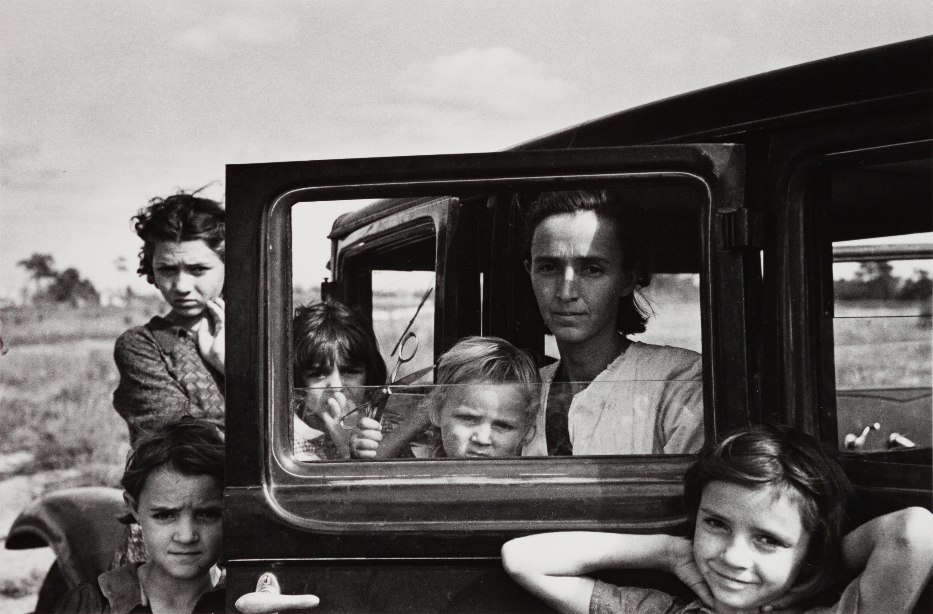 A group of four photographs ( Vernon Evans, Migrant from South Dakota, Montana , 1936; Minnie Knox, Garrett County, Maryland, 1937 (printed 1976); Oklahoma Migrants, 1936; Dust Storm, Cimarron County, Oklahoma, 1936)