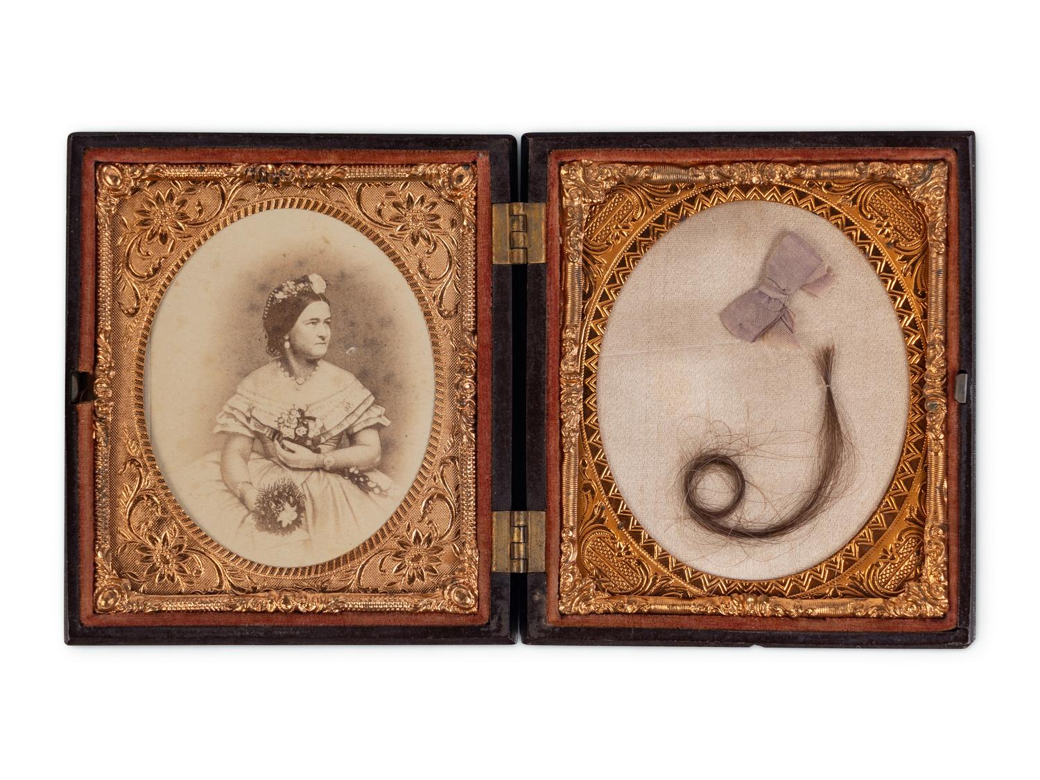 [LINCOLN FAMILY]. Locks of hair purportedly from Abraham Lincoln, Mary Todd Lincoln, and William ("Willie") Lincoln.
