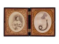 [LINCOLN FAMILY]. Locks of hair purportedly from Abraham Lincoln, Mary Todd Lincoln, and William ("Willie") Lincoln.