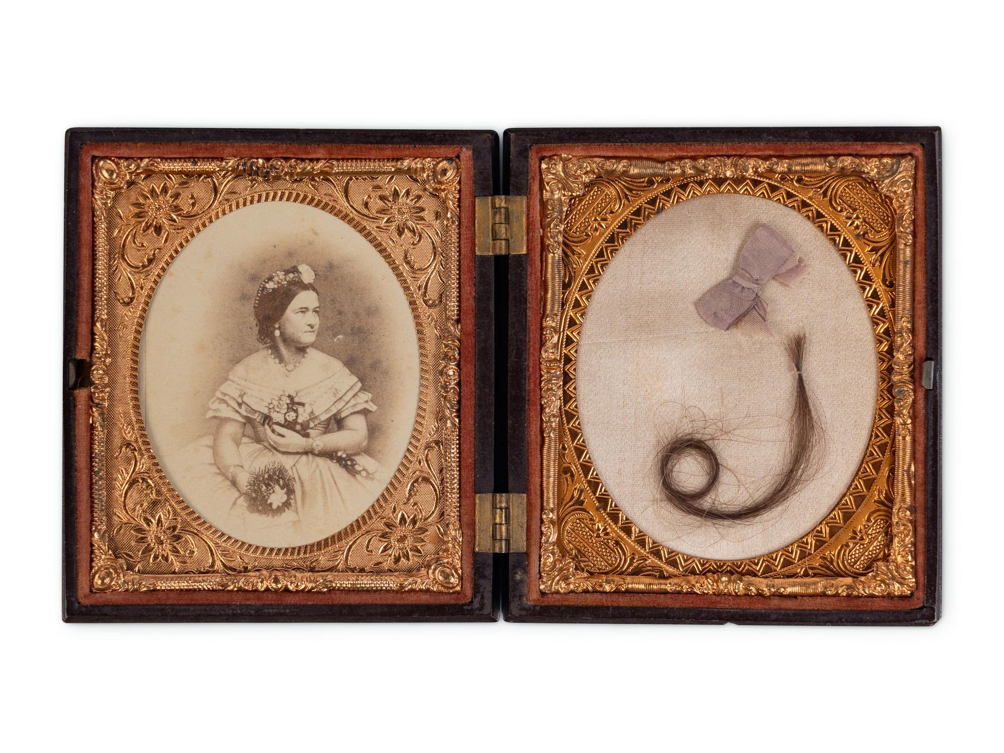[LINCOLN FAMILY]. Locks of hair purportedly from Abraham Lincoln, Mary Todd Lincoln, and William ("Willie") Lincoln.