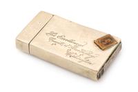 An American Silver Match Safe, Late 19th/Early 20th Century, in the form of a stamped envelope.
