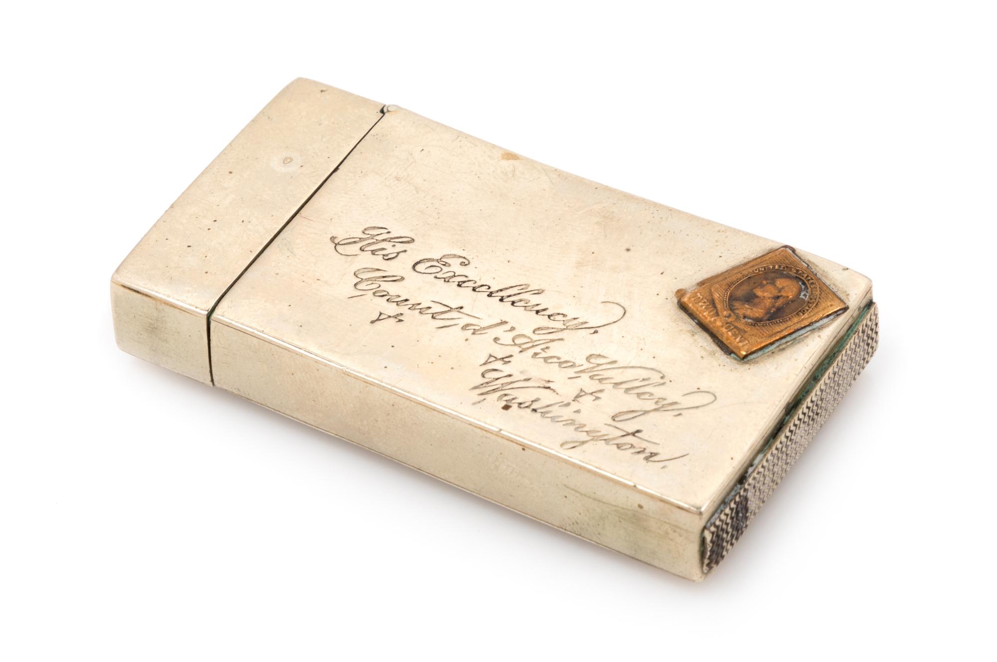An American Silver Match Safe, Late 19th/Early 20th Century, in the form of a stamped envelope.