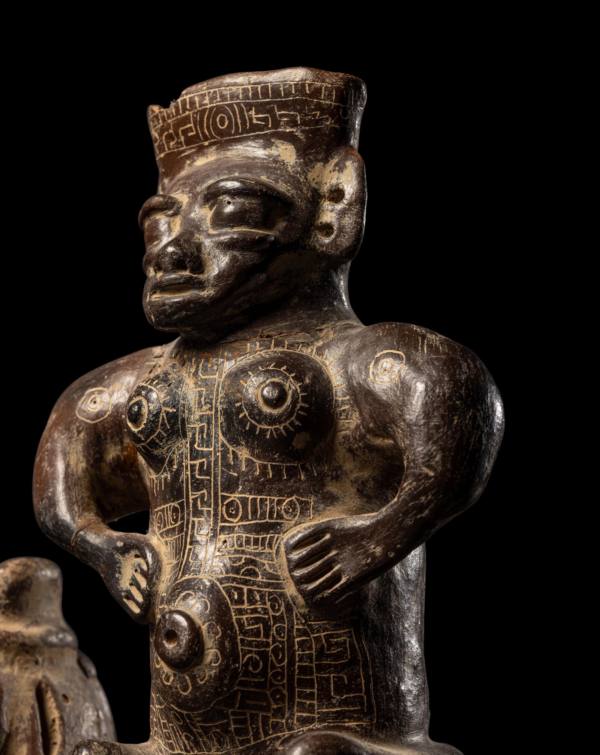 A Guanacaste Seated Female Figure