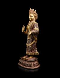 A Nepalese Gilt Bronze Standing Figure of Dipankara