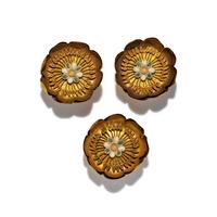 Three Hellenistic Gold and Enamel Rosettes