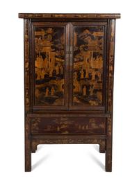 A Chinese Black Lacquer and Parcel Gilt Cabinet