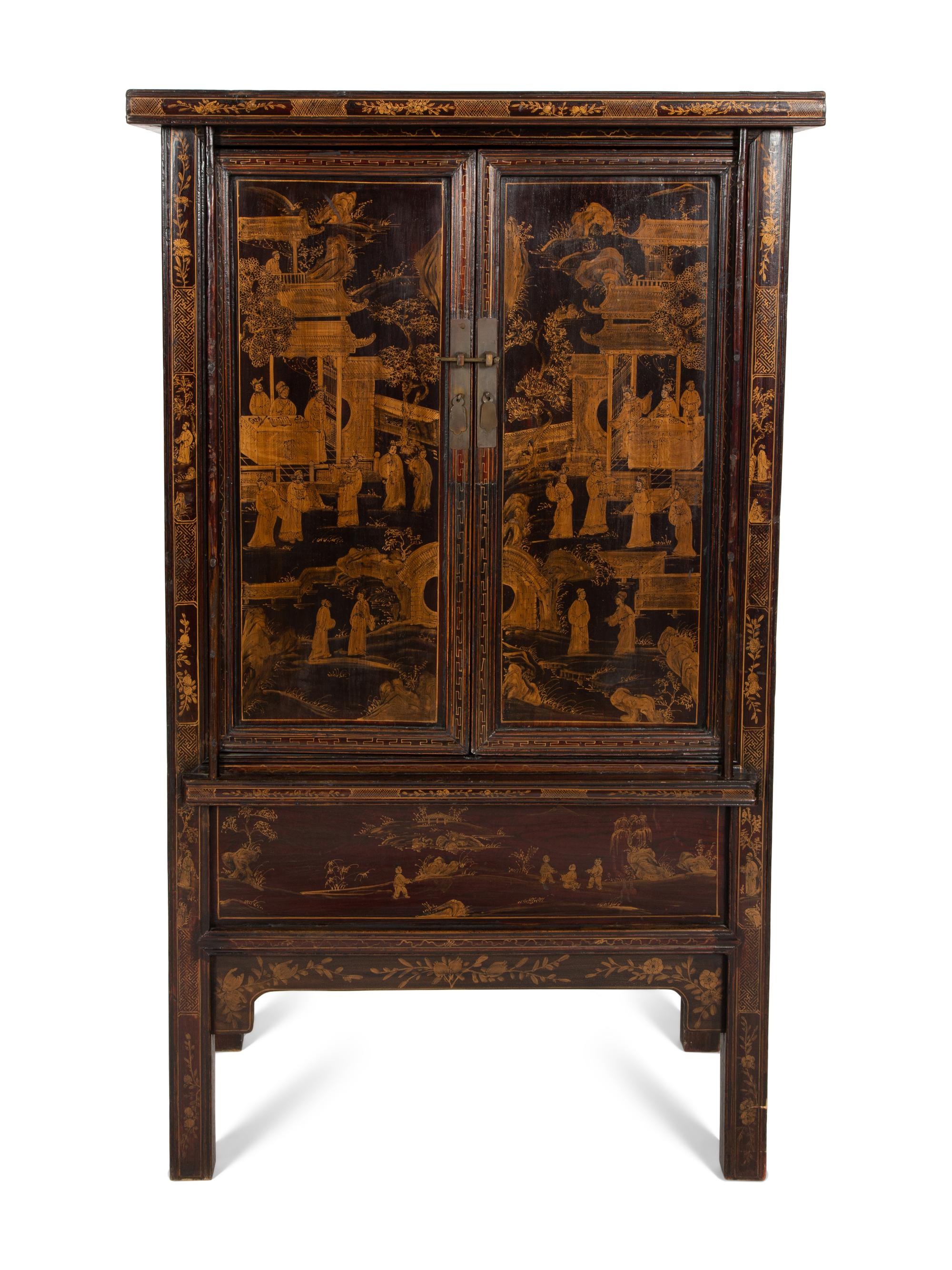 A Chinese Black Lacquer and Parcel Gilt Cabinet