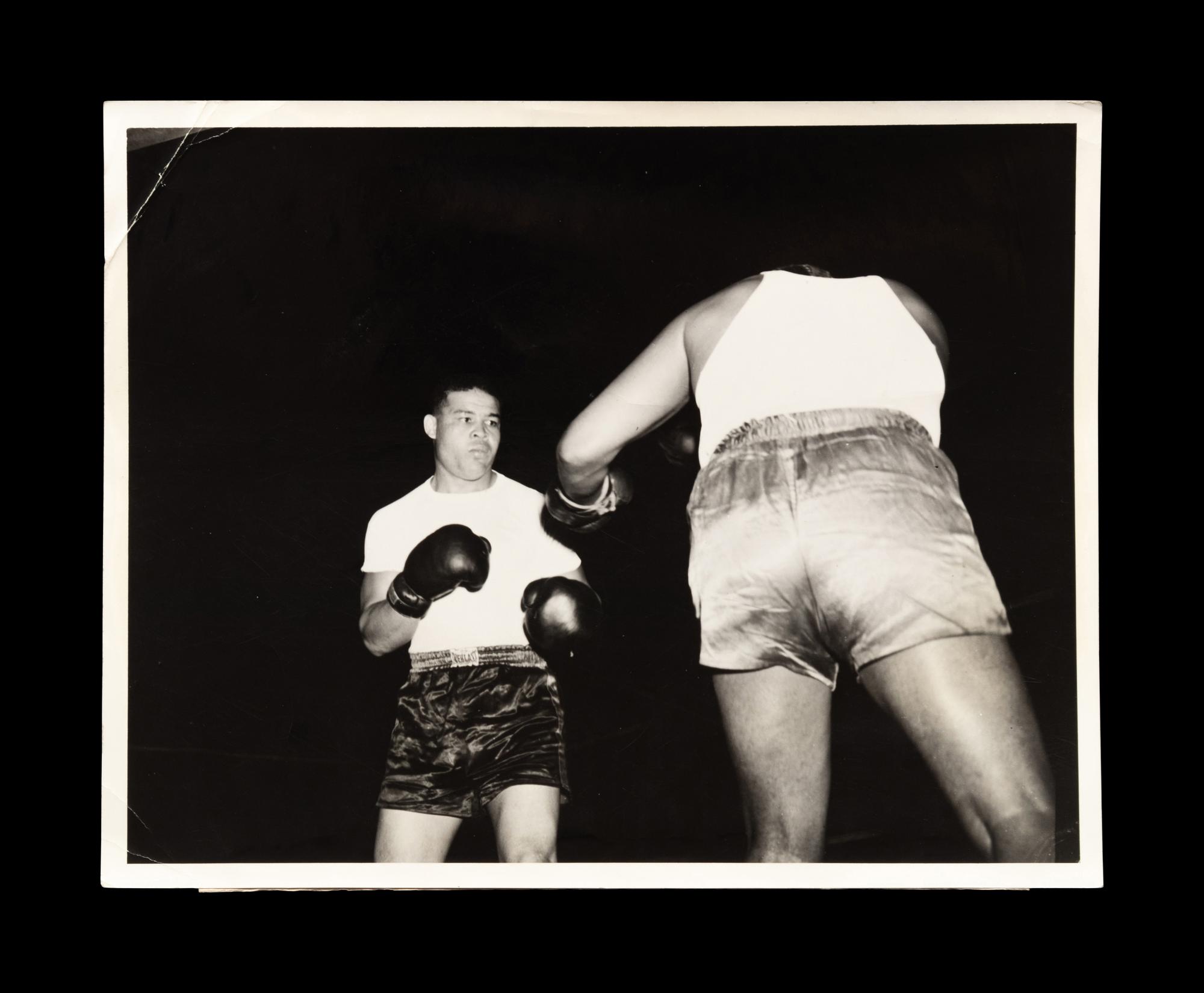 A Group of 22 Original Boxing Photographs Including Joe Louis and Jack Dempsey,