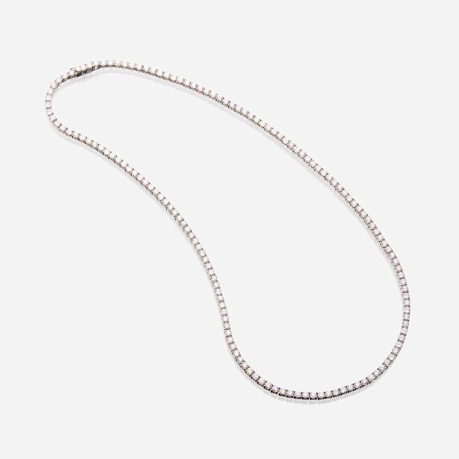 A diamond and fourteen karat white gold rivière necklace