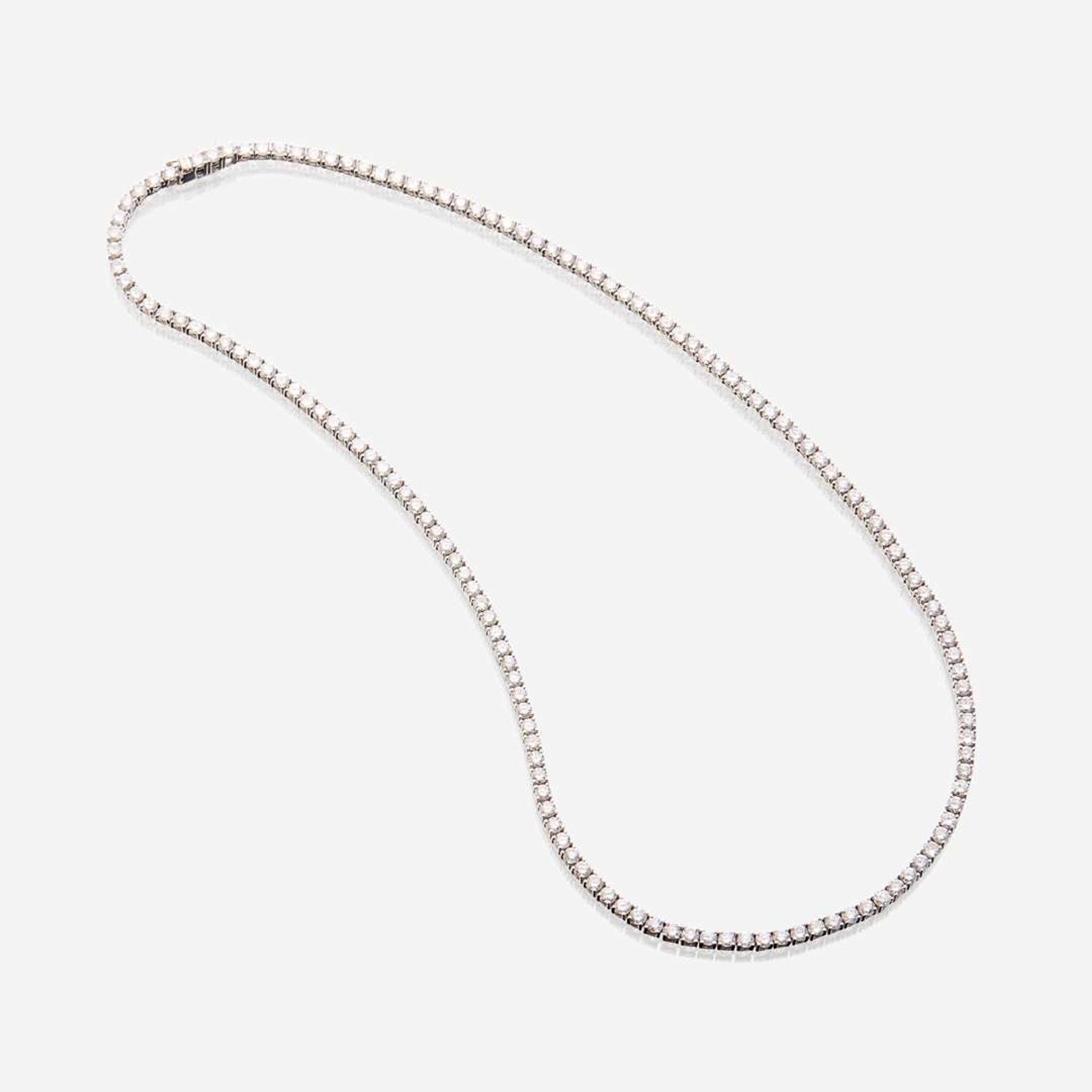 A diamond and fourteen karat white gold rivière necklace