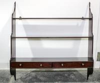 An English Mahogany Hanging Étagère Width 36 inches. — 20TH CENTURY