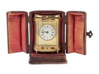 A Continental Leather-Cased Brass Carriage Clock