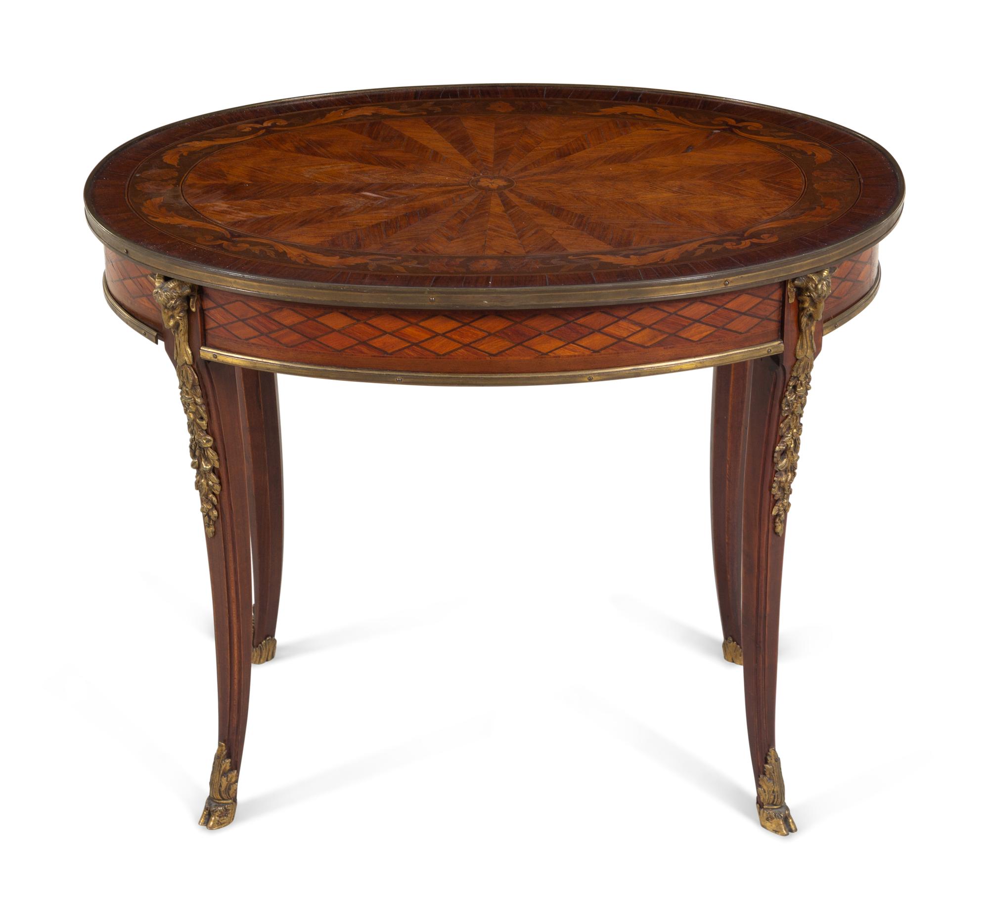 A Continental Marquetry and Gilt Metal Mounted Low Table