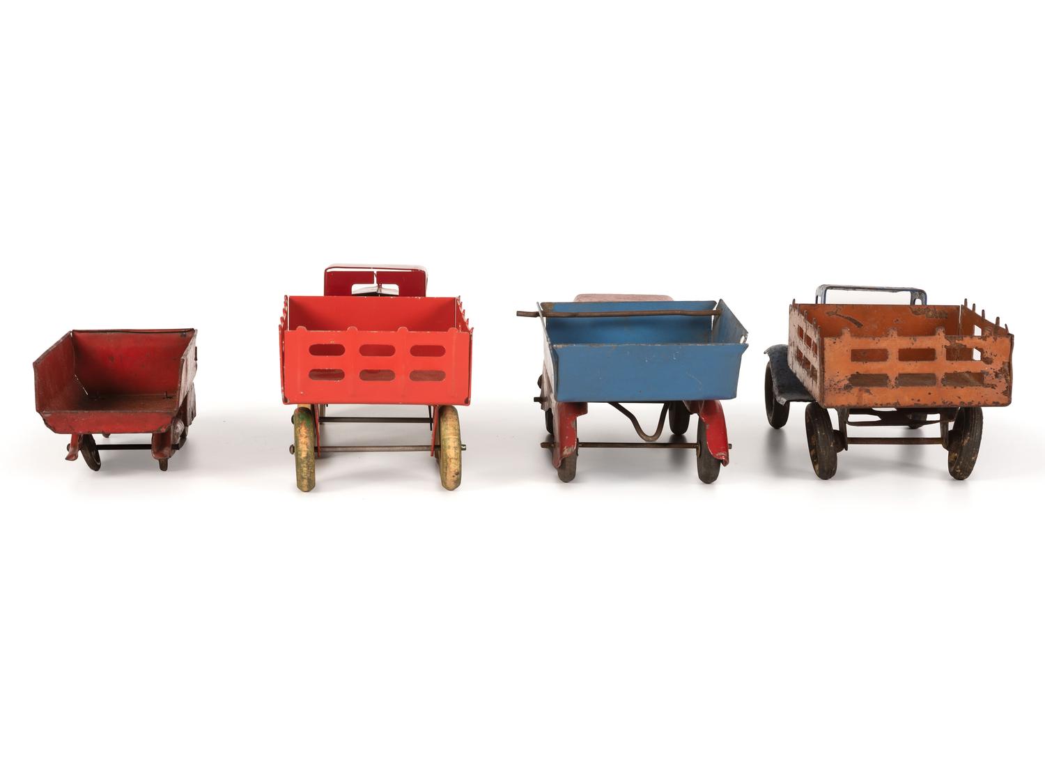Ten Tin and Pressed Steel Toy Trucks and Wagons