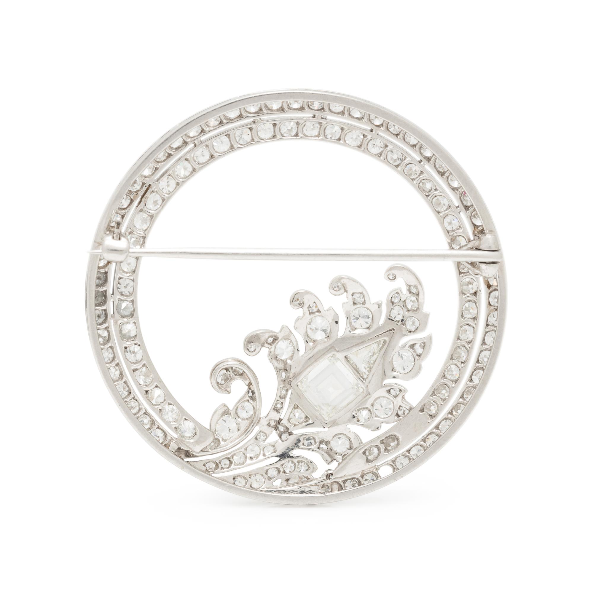 DIAMOND AND PLATINUM CIRCLE BROOCH