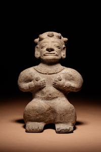 A Tumaco Female Figure Holding Breasts