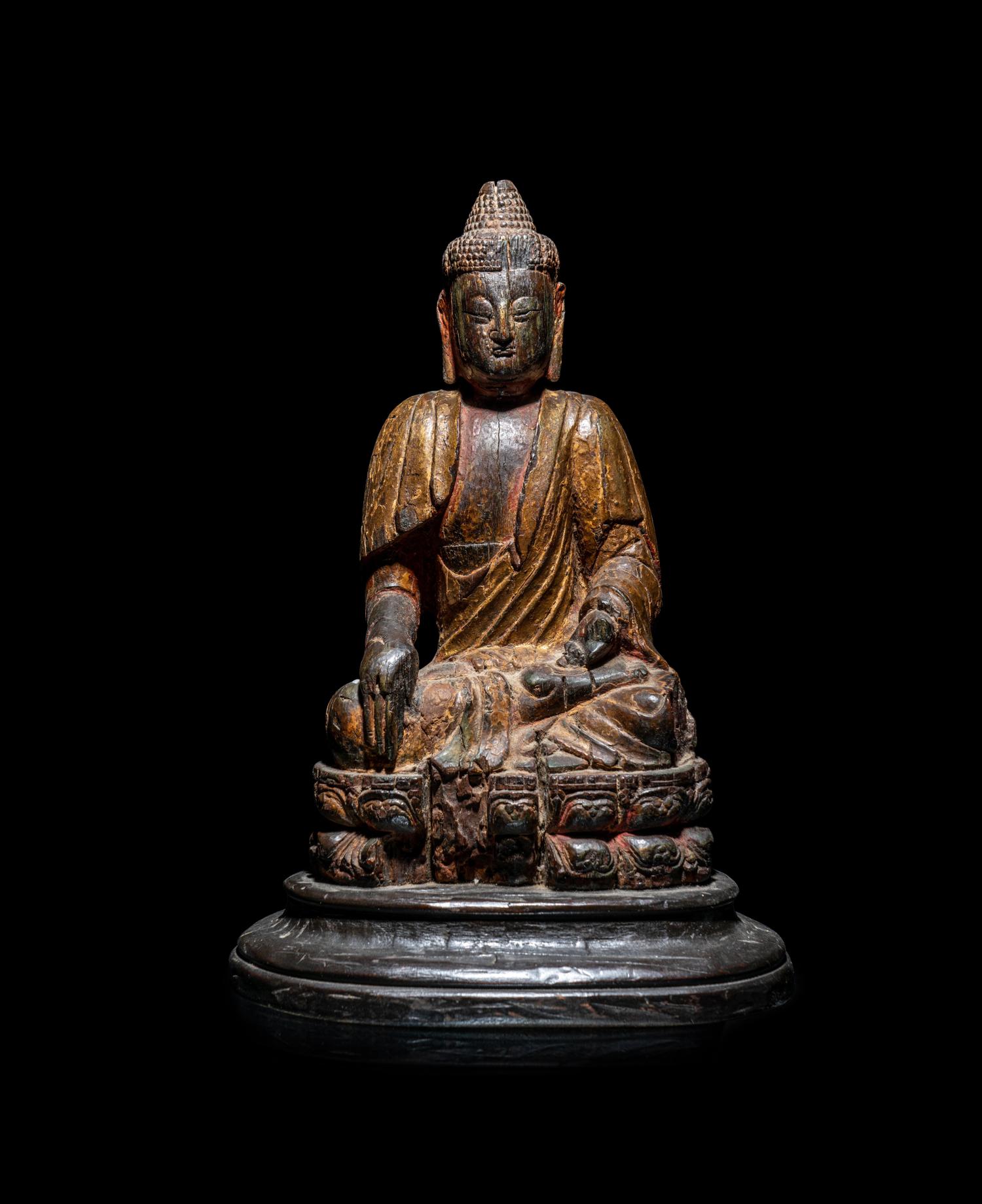 A Chinese Carved Wood Figure of Buddha Shakyamuni