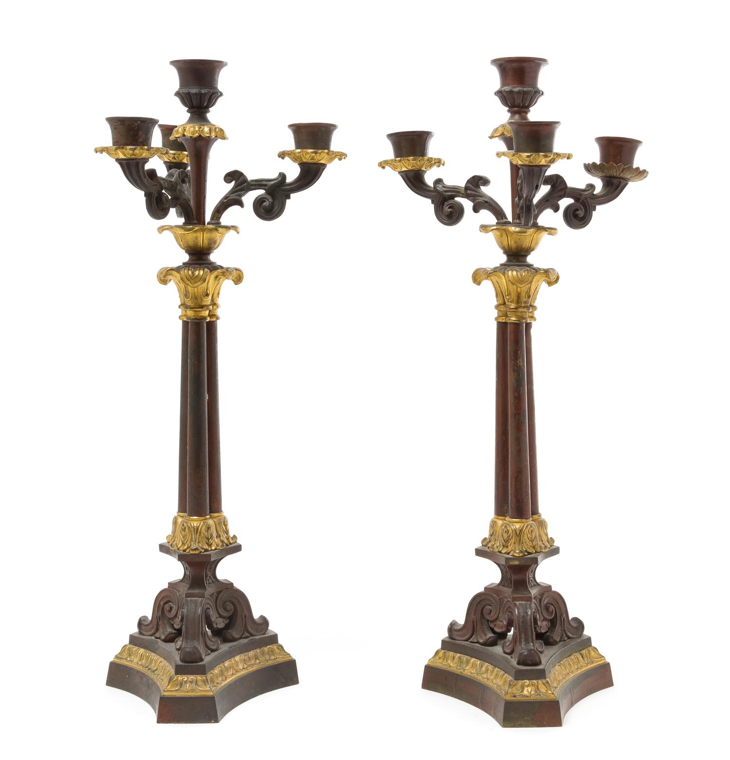 A Pair of Empire Style Gilt and Patinated Metal Four-Light Candelabra Height 16 5/8 inches.