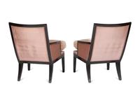 A Pair of Ebonised Bergères