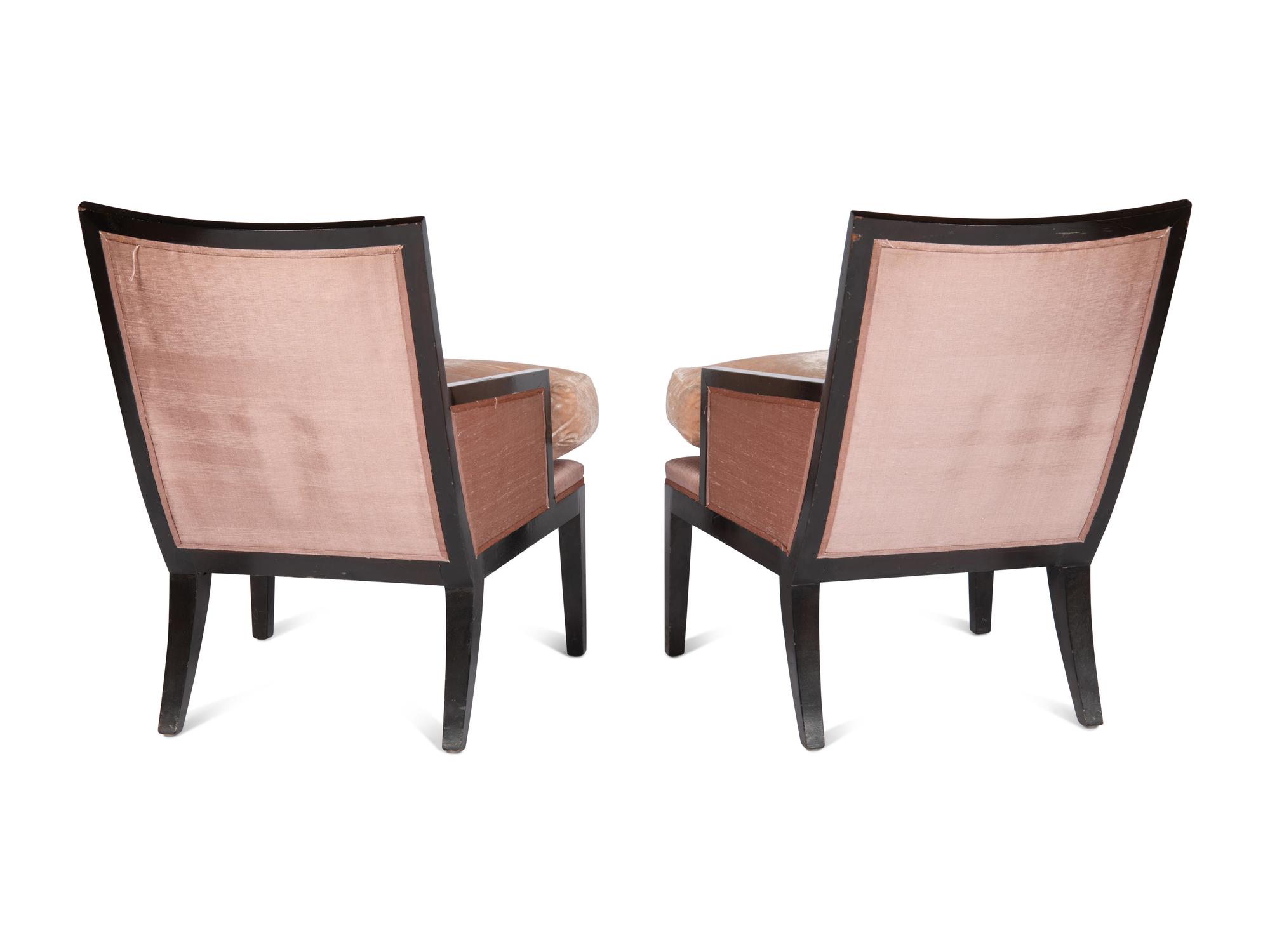 A Pair of Ebonised Bergères