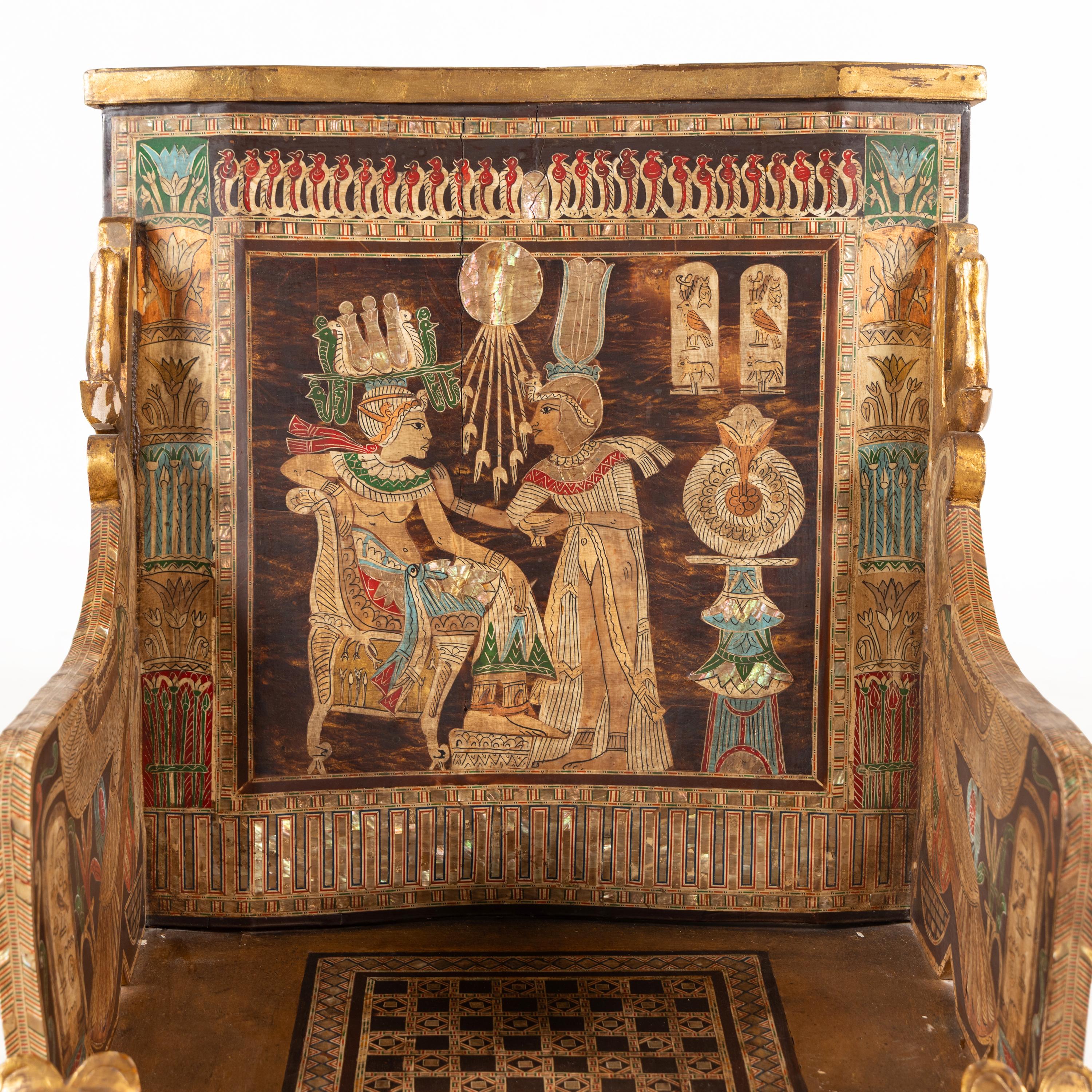 An Egyptian Style Polychrome-Painted and Giltwood Throne Chair