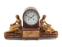A Louis XVI Style Gilt Bronze and Rouge Griotte Marble Mantel Clock