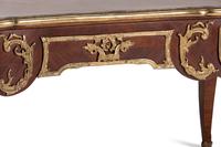 A Louis XV Style Gilt Bronze Mounted Mahogany Bureau Plat