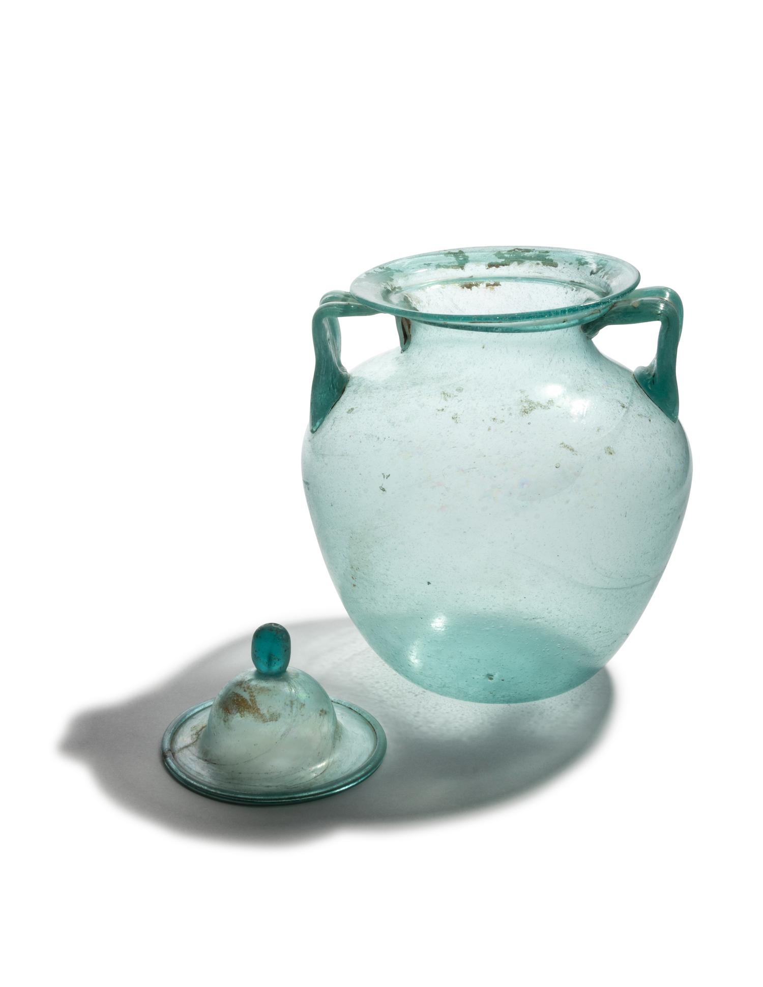 A Roman Glass Cinerary Urn and Lid