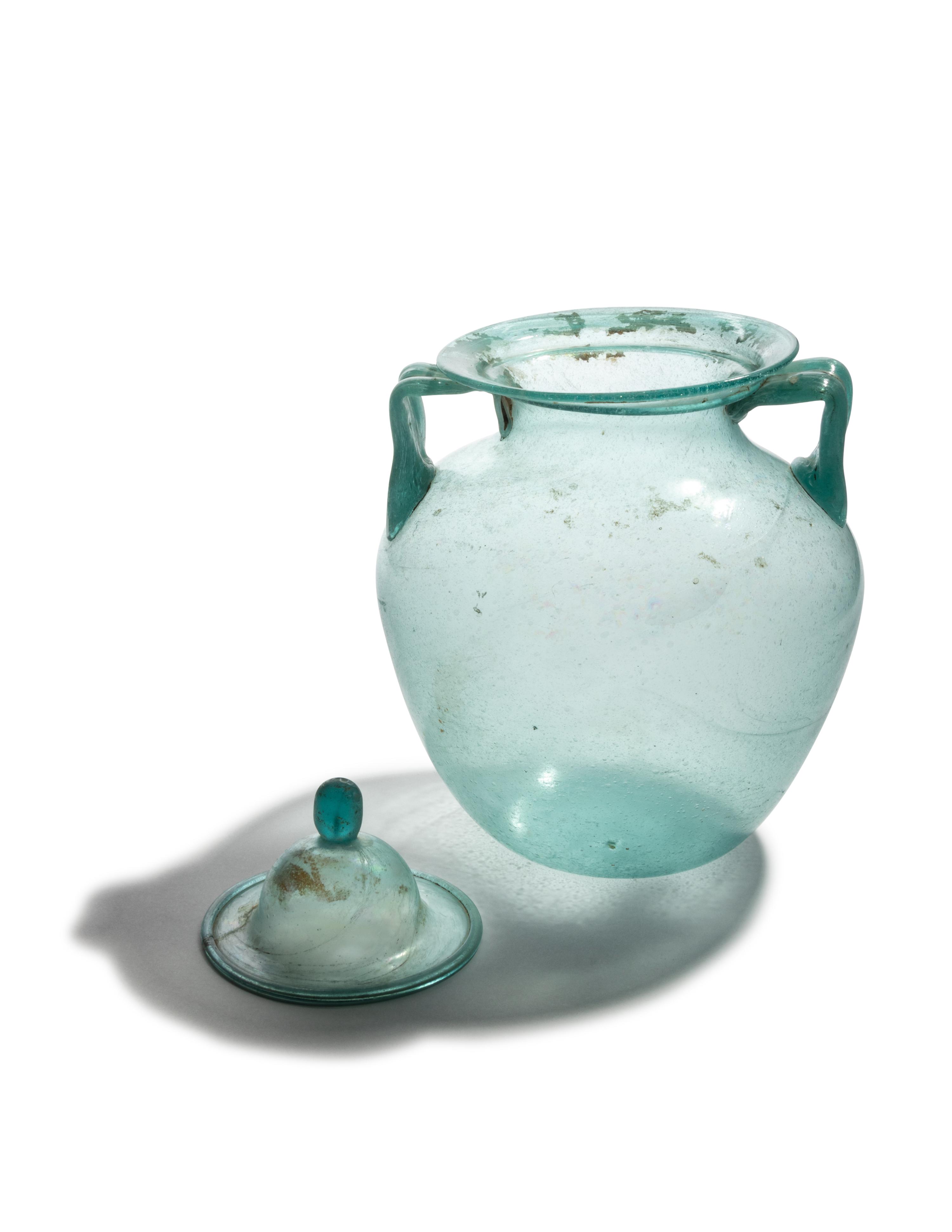 A Roman Glass Cinerary Urn and Lid